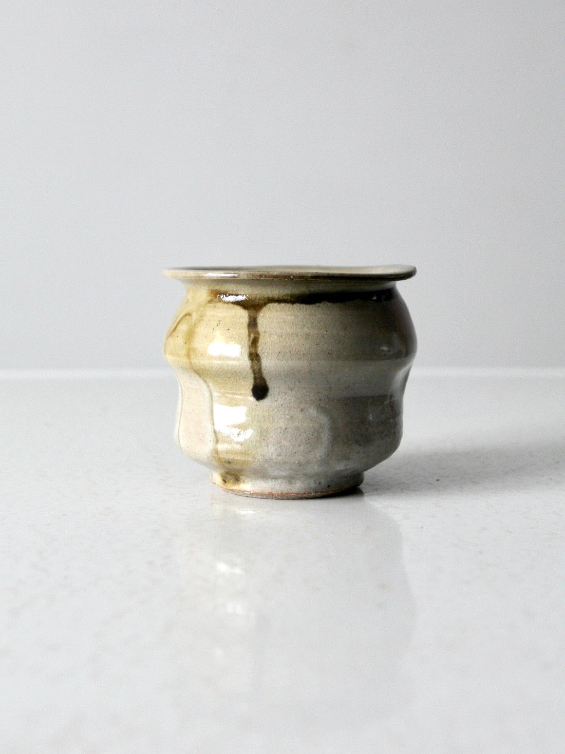 vintage handmade studio pottery vase with drip glaze