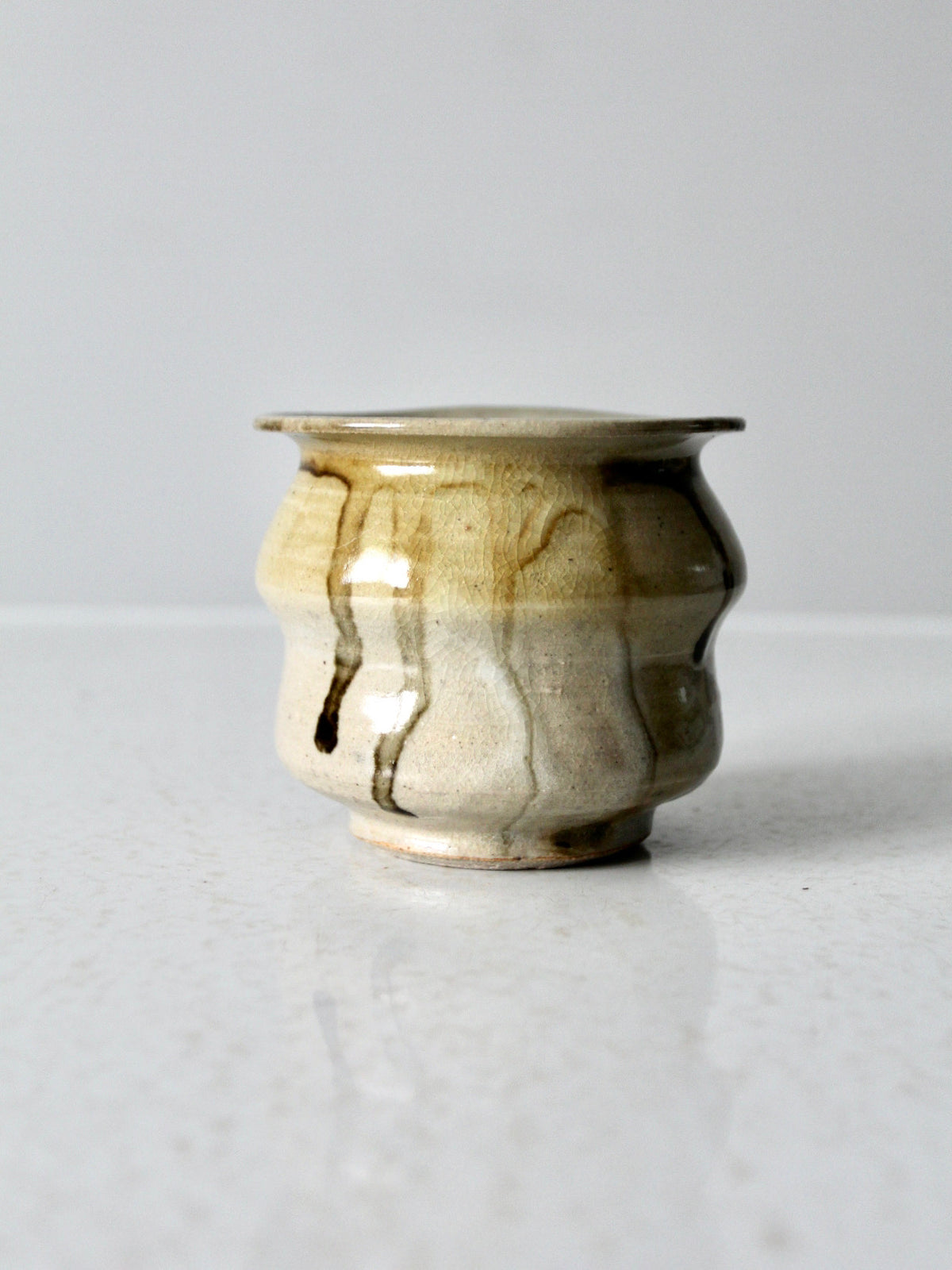 vintage handmade studio pottery vase with drip glaze