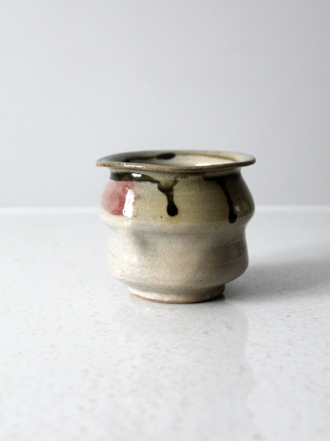 vintage handmade studio pottery vase with drip glaze