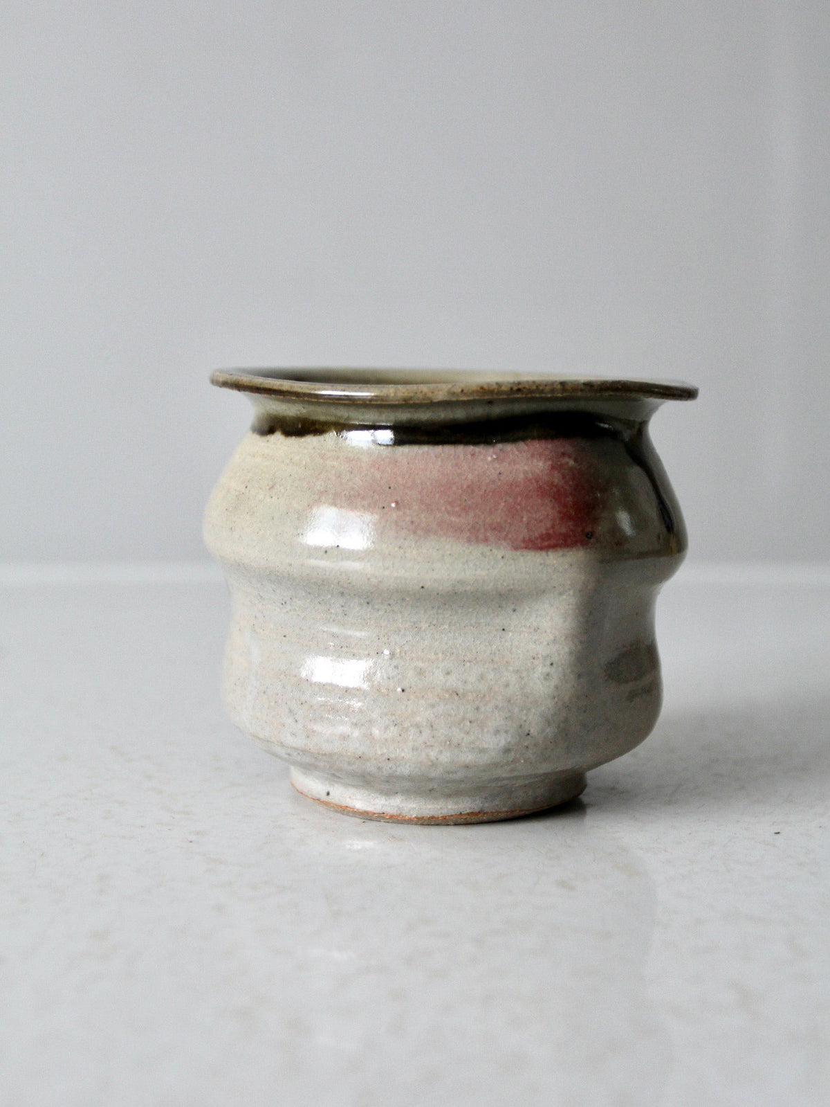vintage handmade studio pottery vase with drip glaze