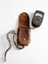 vintage Tower brand gauge with leather pouch
