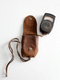 vintage Tower brand gauge with leather pouch