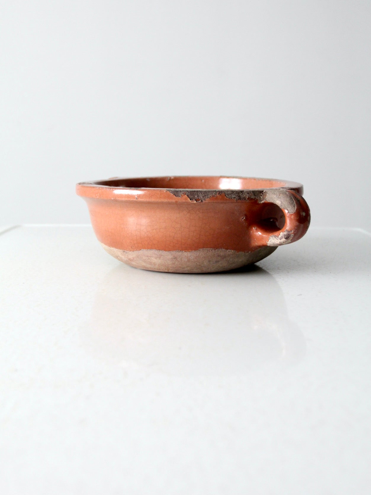 antique terracotta handled earthenware bowl