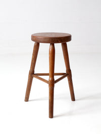 antique primitive three-legged wooden stool