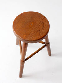 antique primitive three-legged wooden stool