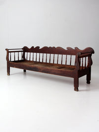 antique 19th century wooden spindle back bench with scalloped crest rail