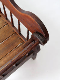 antique 19th century wooden spindle back bench with scalloped crest rail