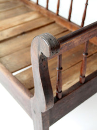 antique 19th century wooden spindle back bench with scalloped crest rail