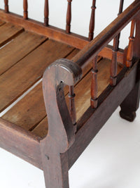 antique 19th century wooden spindle back bench with scalloped crest rail