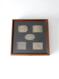 vintage 1970s belt buckles with Americana logos