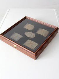 vintage 1970s belt buckles with Americana logos