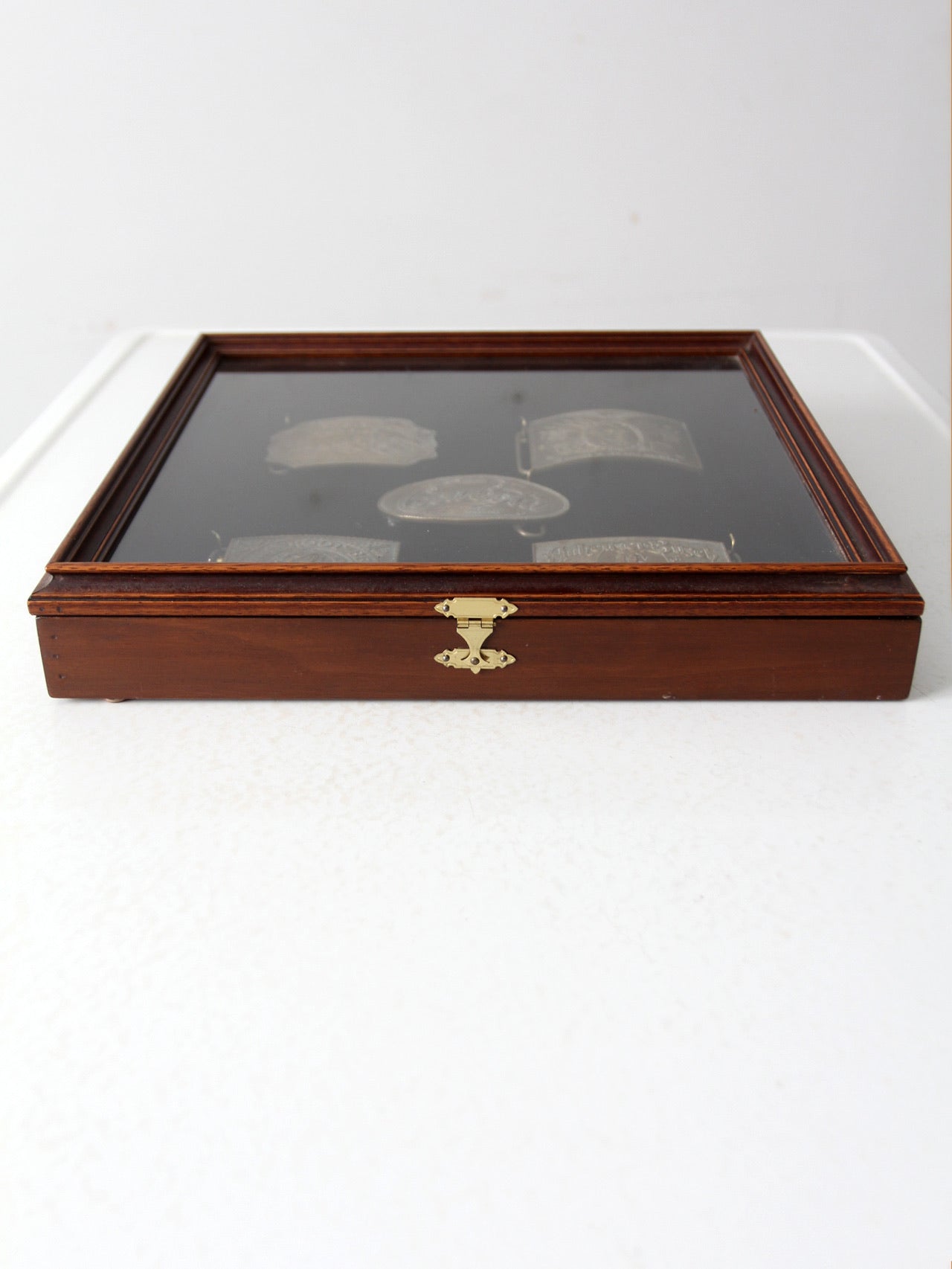 vintage 1970s belt buckles with Americana logos