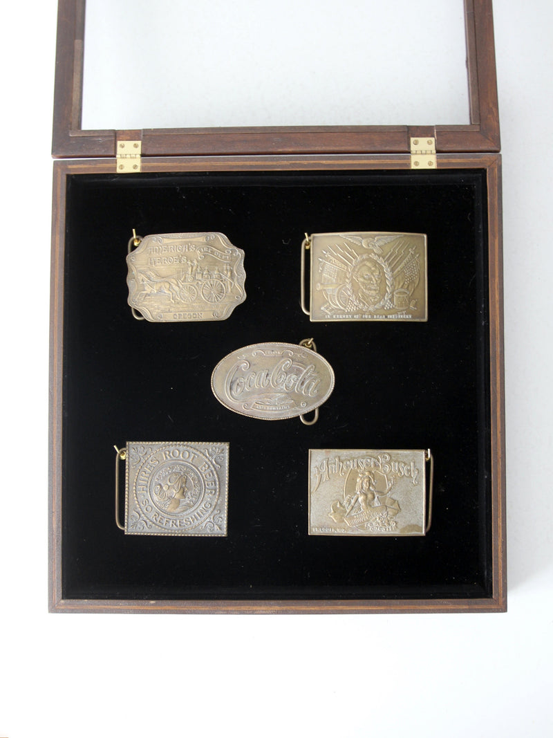 vintage 1970s belt buckles with Americana logos