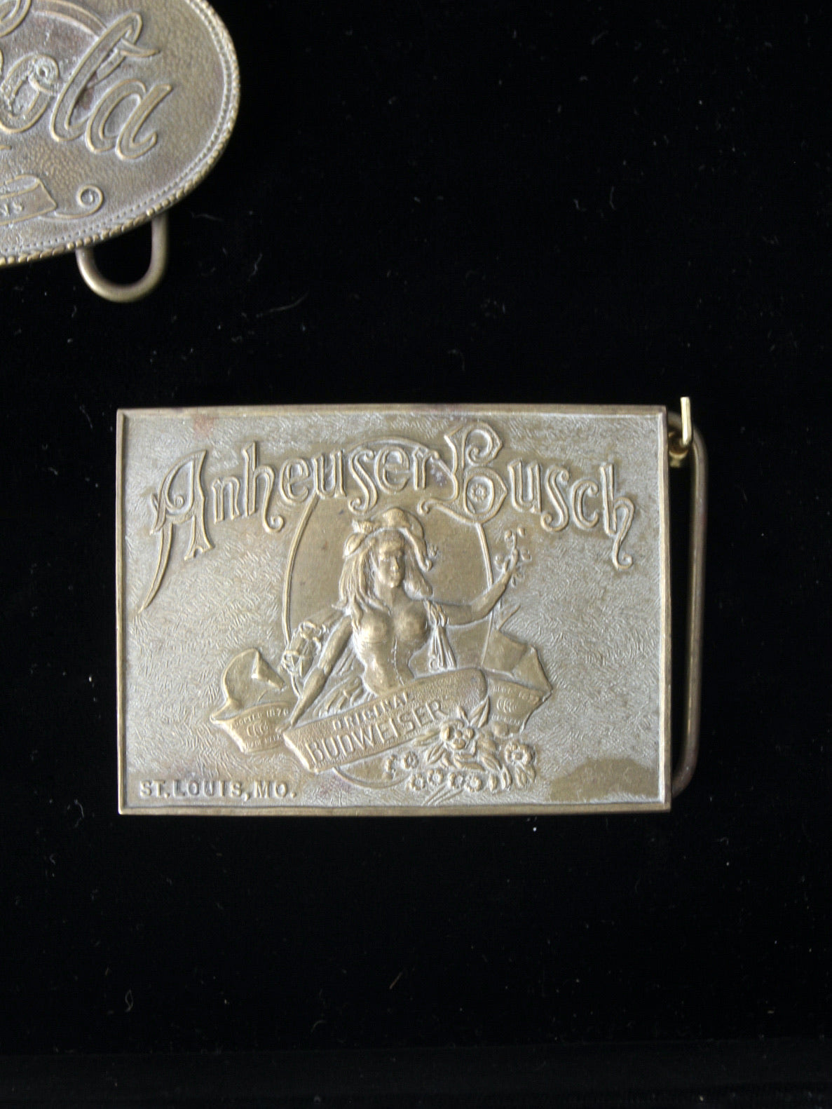 vintage 1970s belt buckles with Americana logos