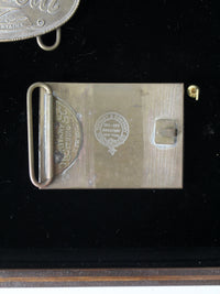 vintage 1970s belt buckles with Americana logos