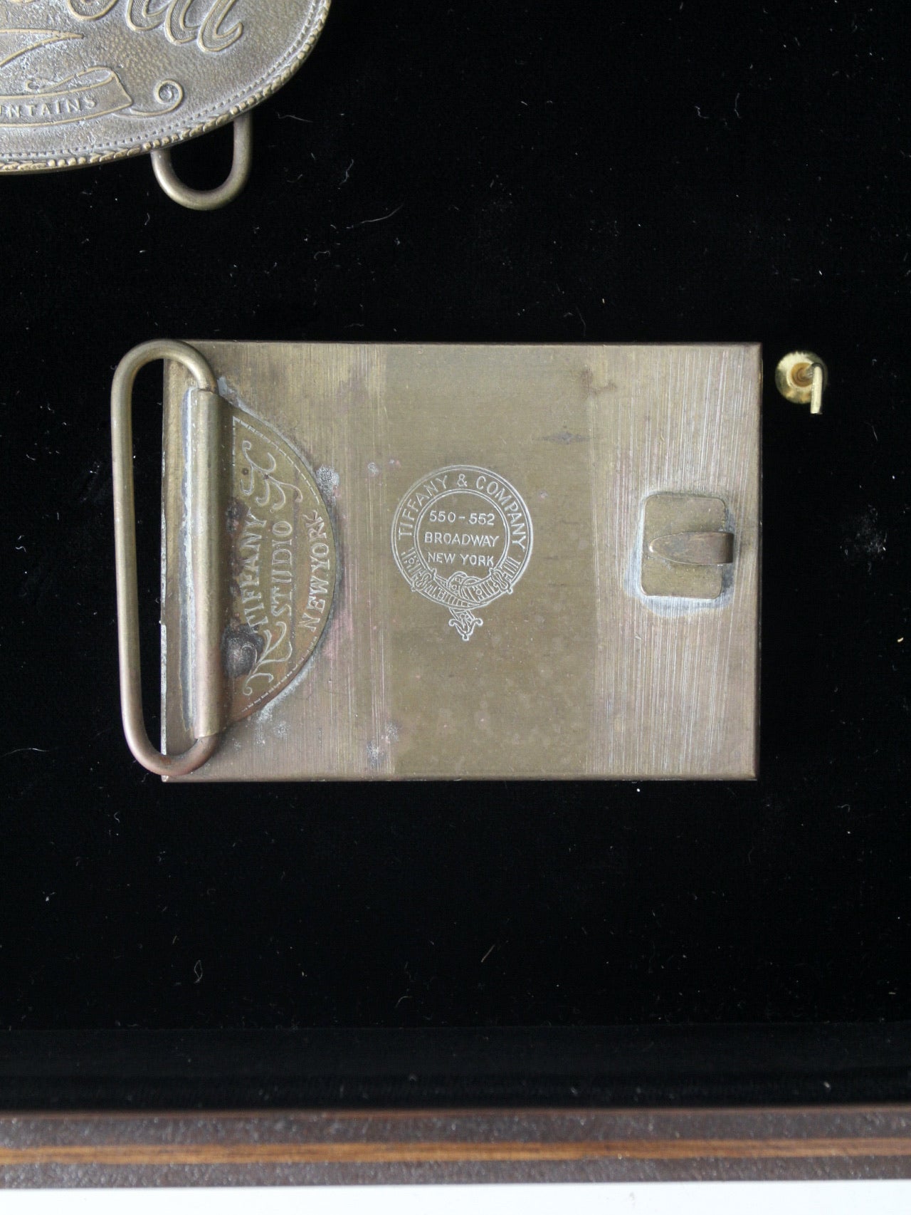 vintage 1970s belt buckles with Americana logos