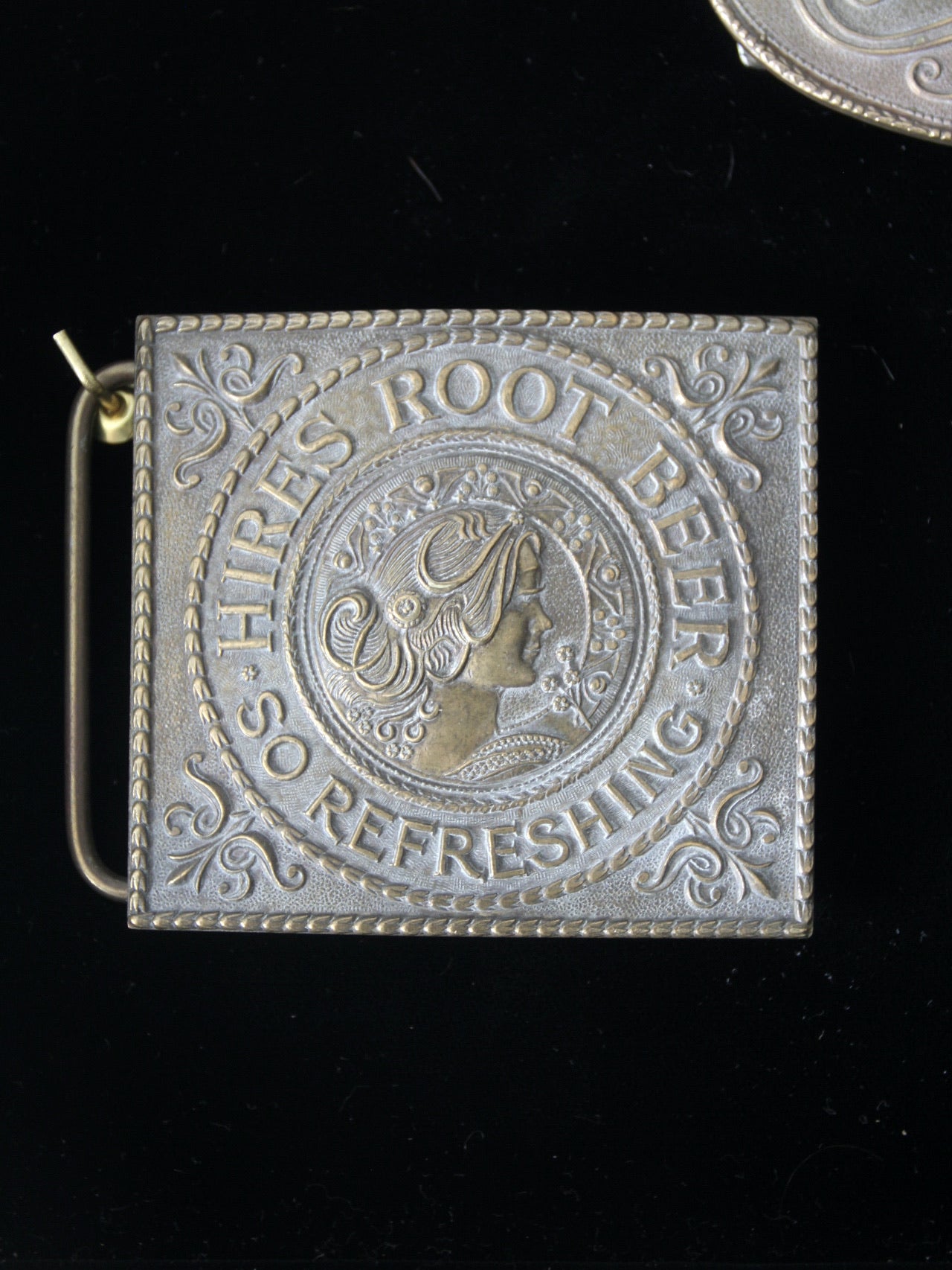 vintage 1970s belt buckles with Americana logos