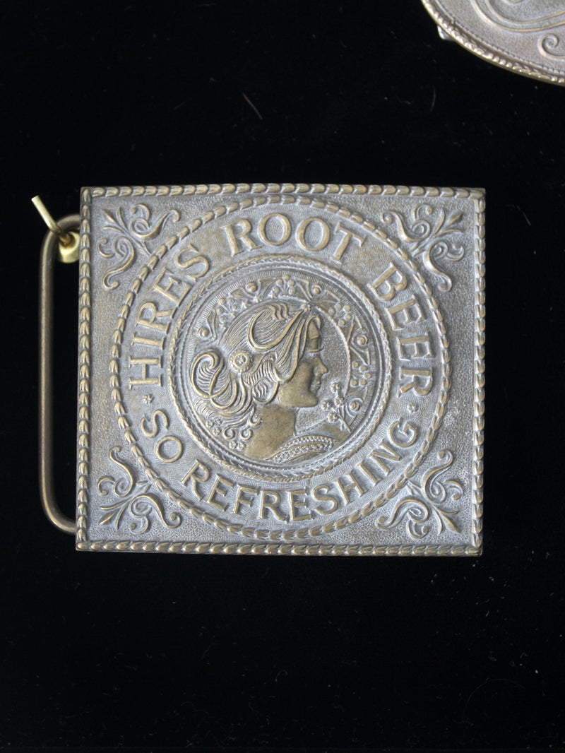 vintage 1970s belt buckles with Americana logos