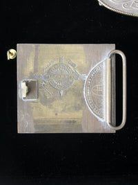 vintage 1970s belt buckles with Americana logos