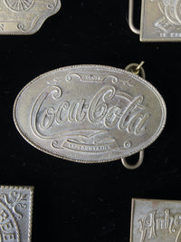 vintage 1970s belt buckles with Americana logos