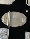 vintage 1970s belt buckles with Americana logos