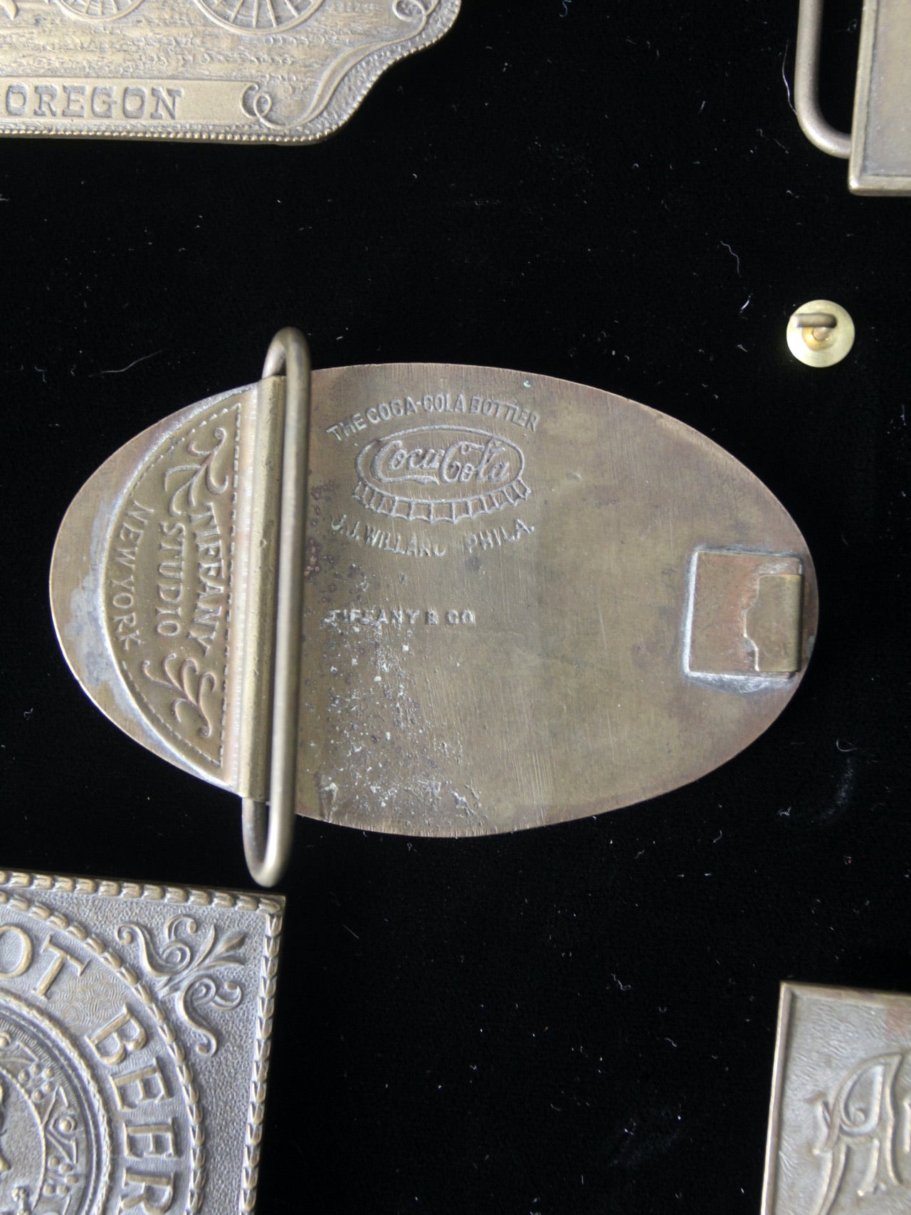 vintage 1970s belt buckles with Americana logos