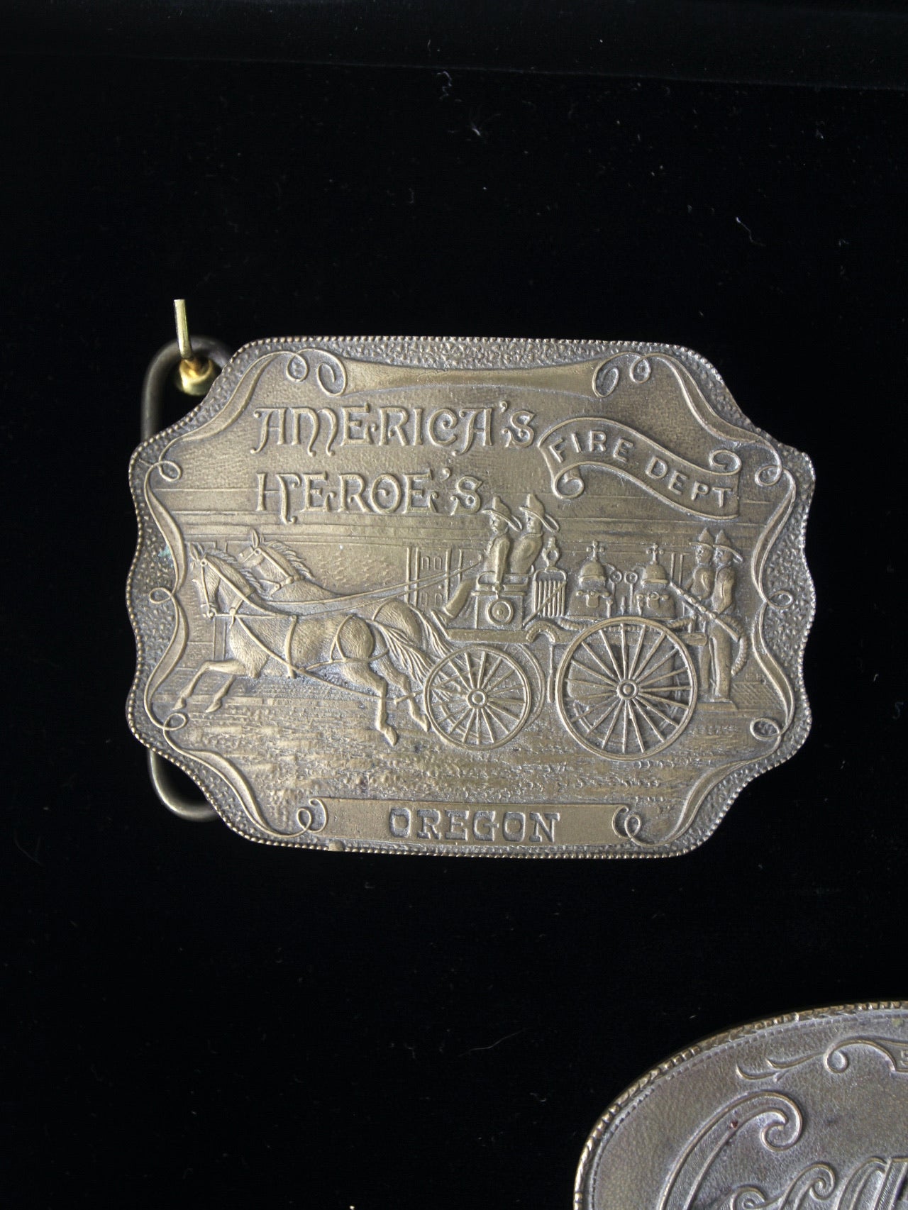 vintage 1970s belt buckles with Americana logos