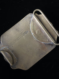 vintage 1970s belt buckles with Americana logos