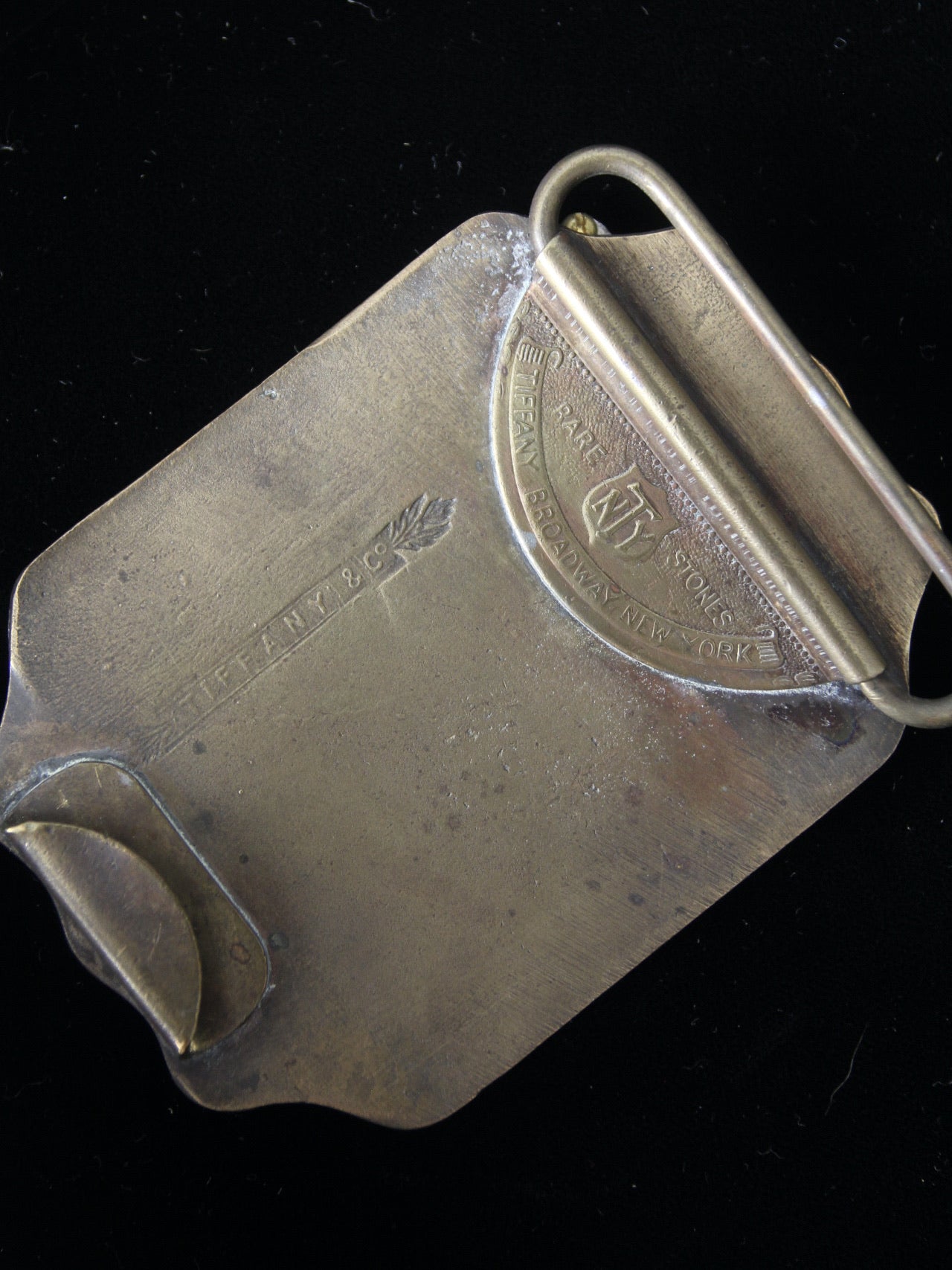 vintage 1970s belt buckles with Americana logos