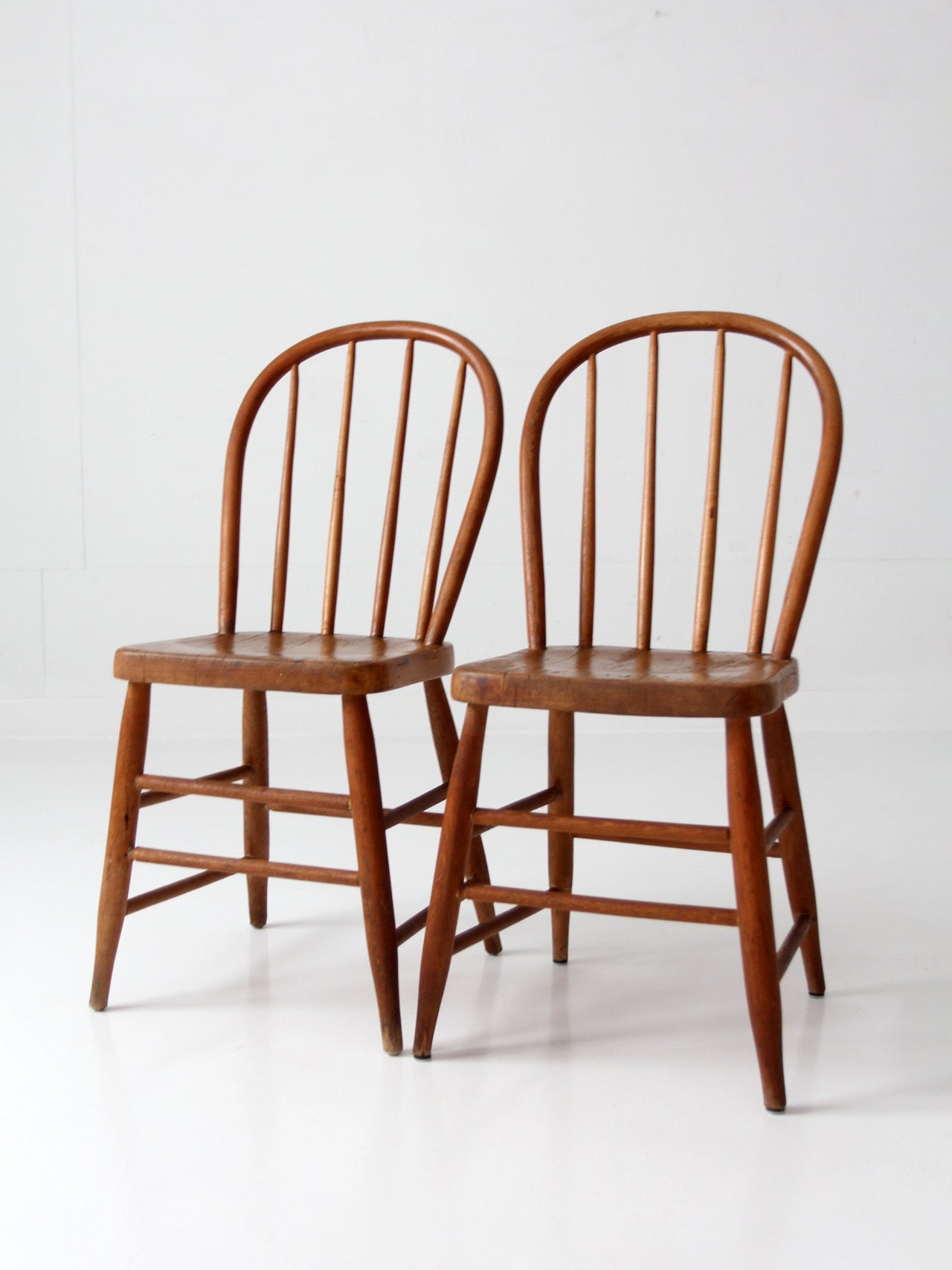 pair of vintage Windsor bow back chairs