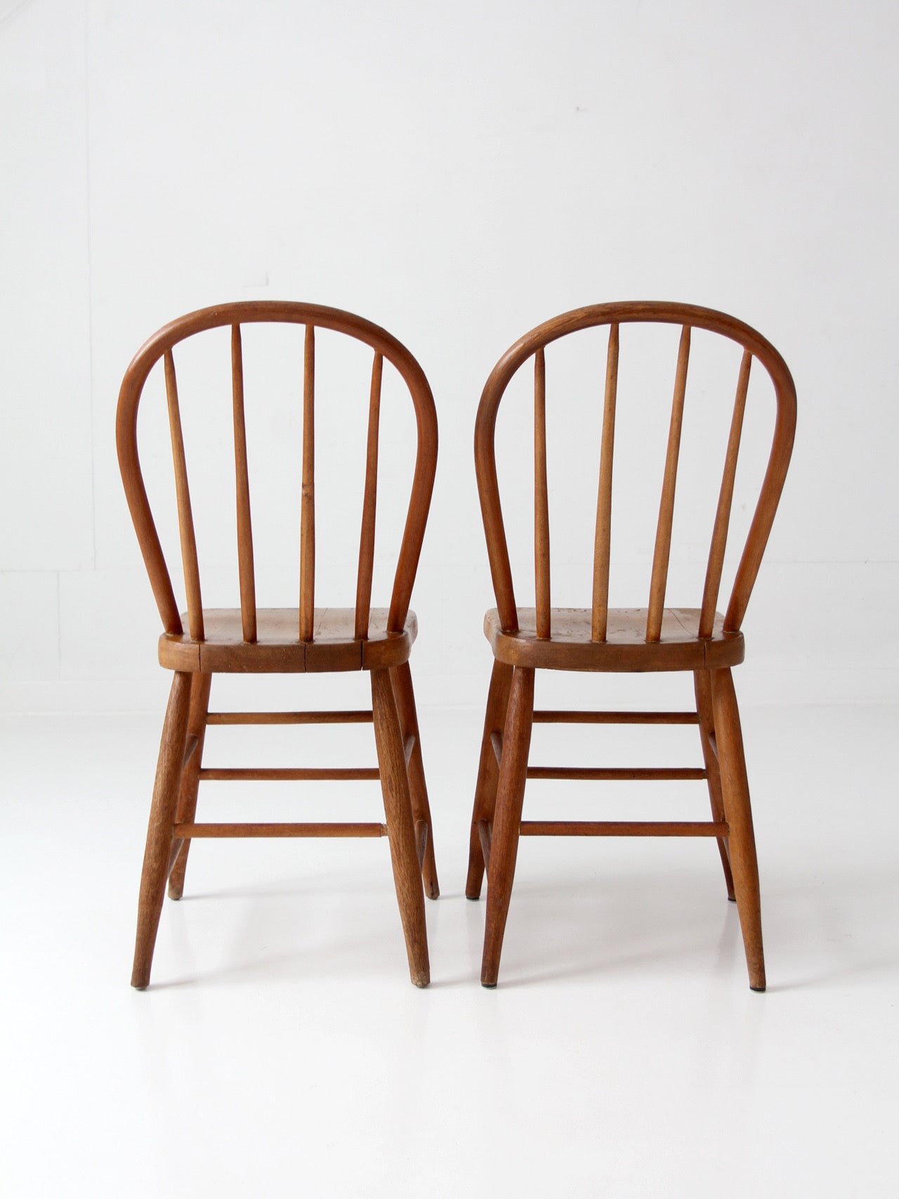 pair of vintage Windsor bow back chairs
