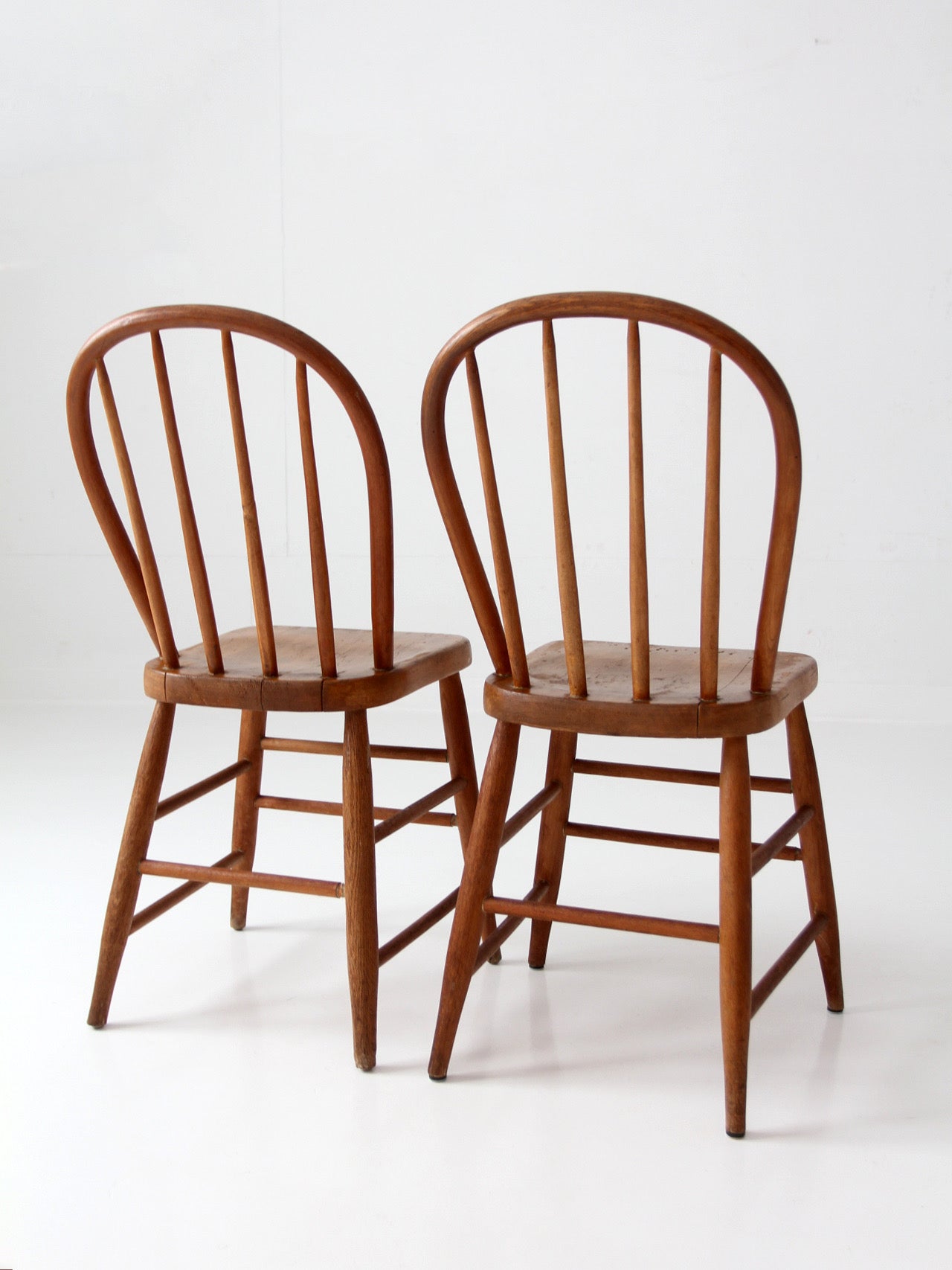 pair of vintage Windsor bow back chairs