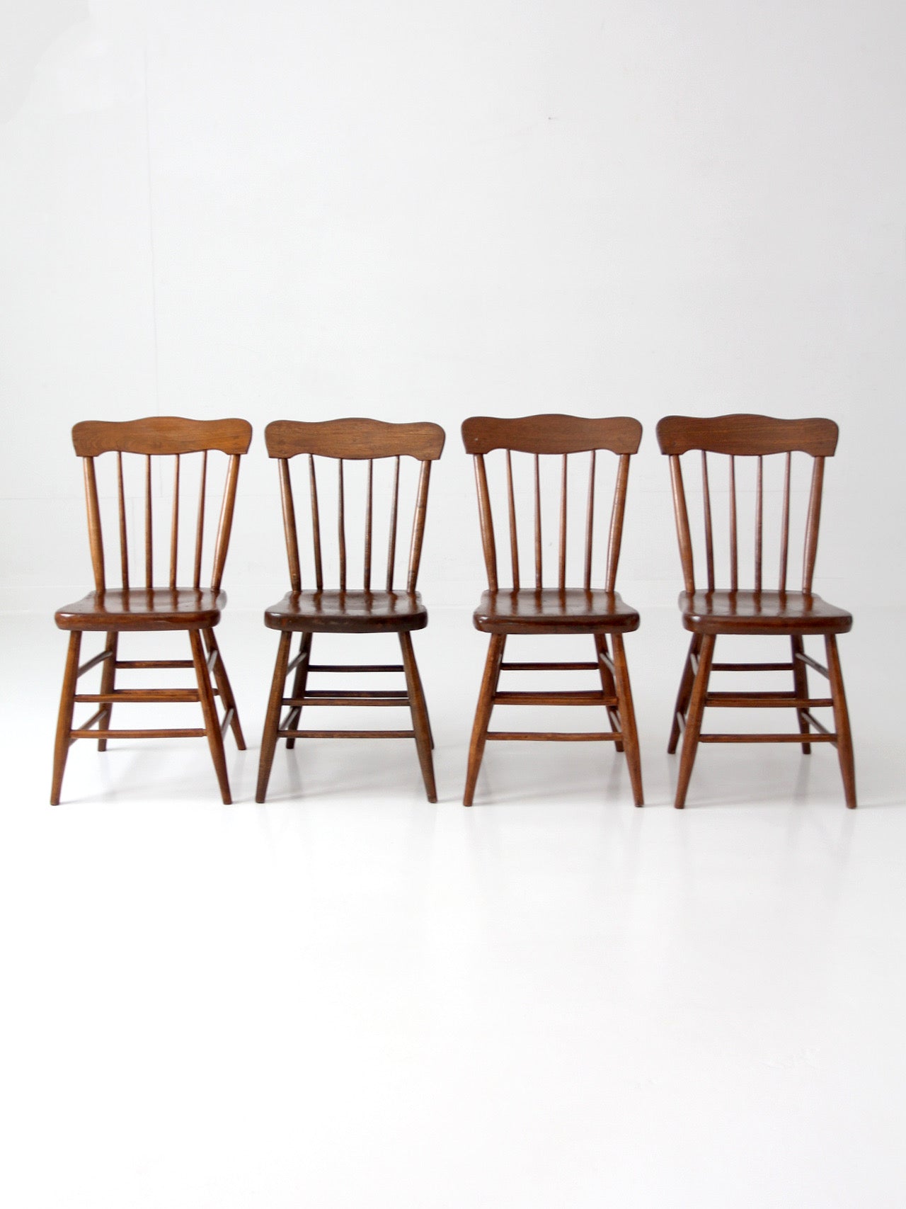 set of 4 antique plank seat farmhouse Windsor chairs