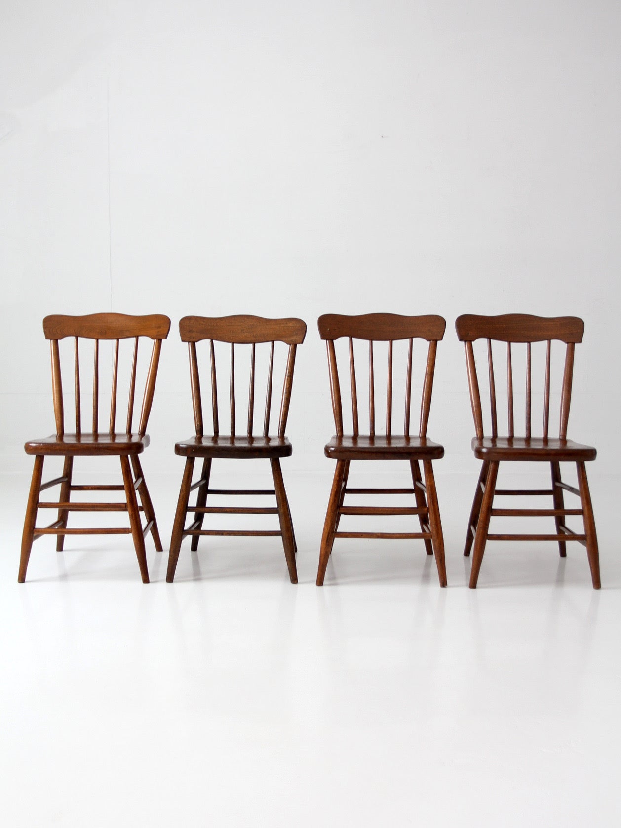 set of 4 antique plank seat farmhouse Windsor chairs