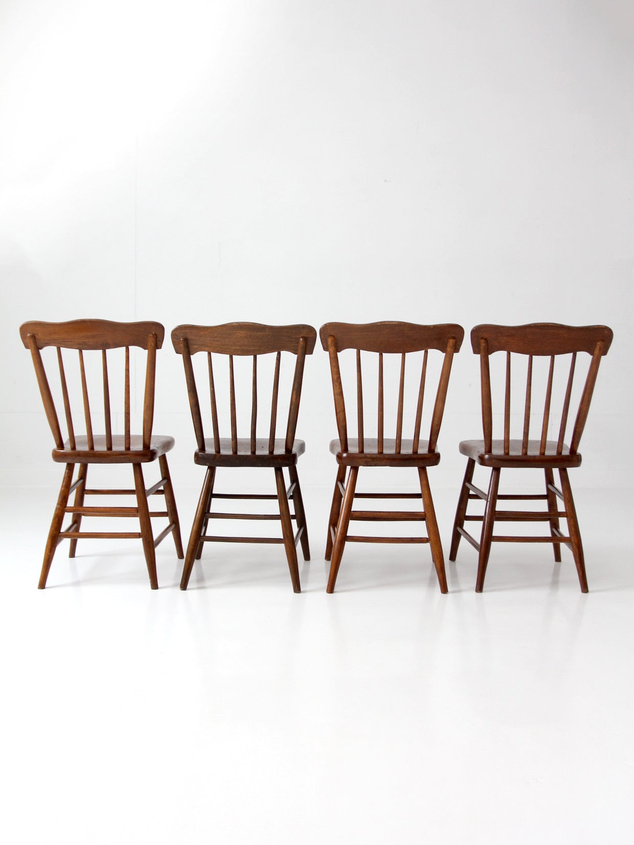 set of 4 antique plank seat farmhouse Windsor chairs