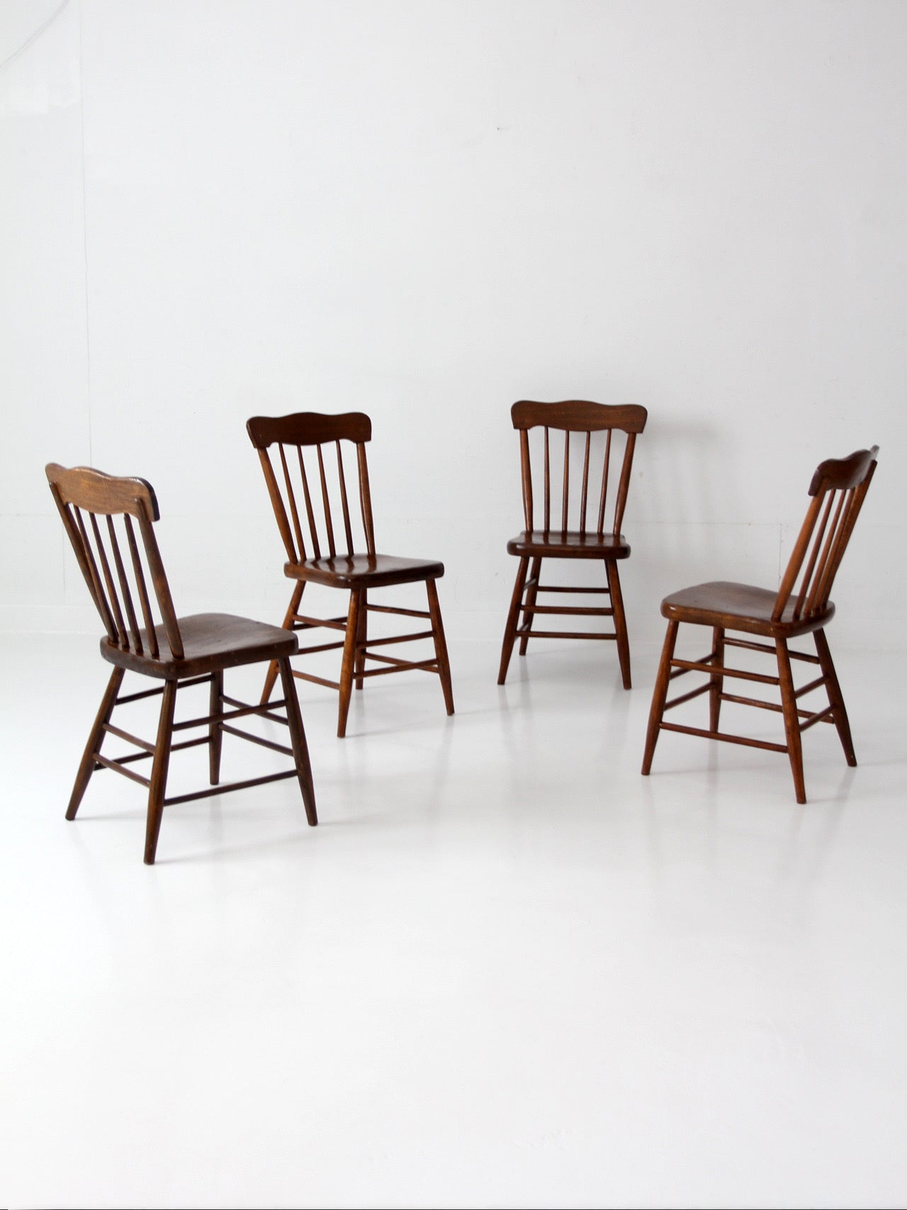 set of 4 antique plank seat farmhouse Windsor chairs