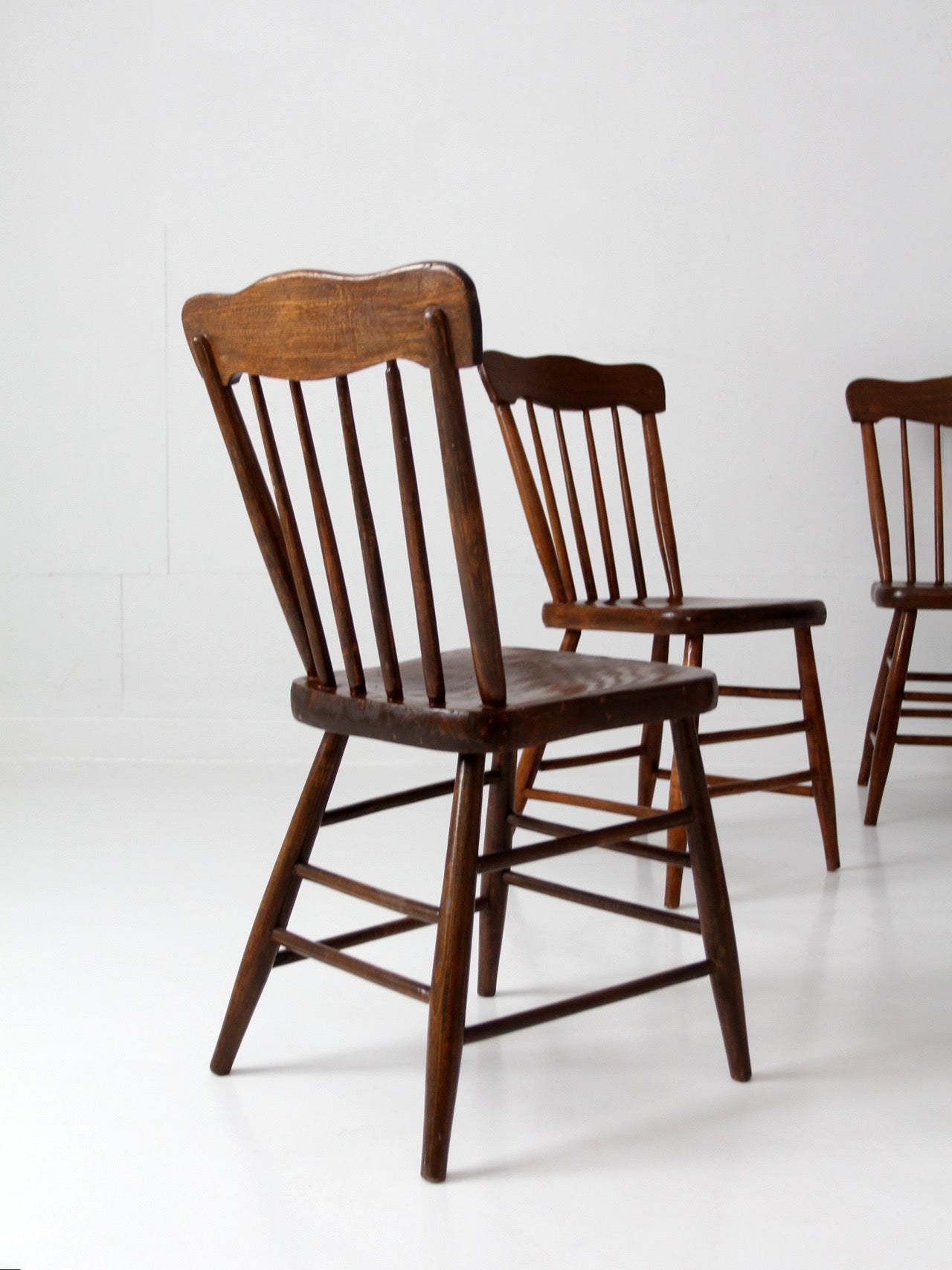 set of 4 antique plank seat farmhouse Windsor chairs
