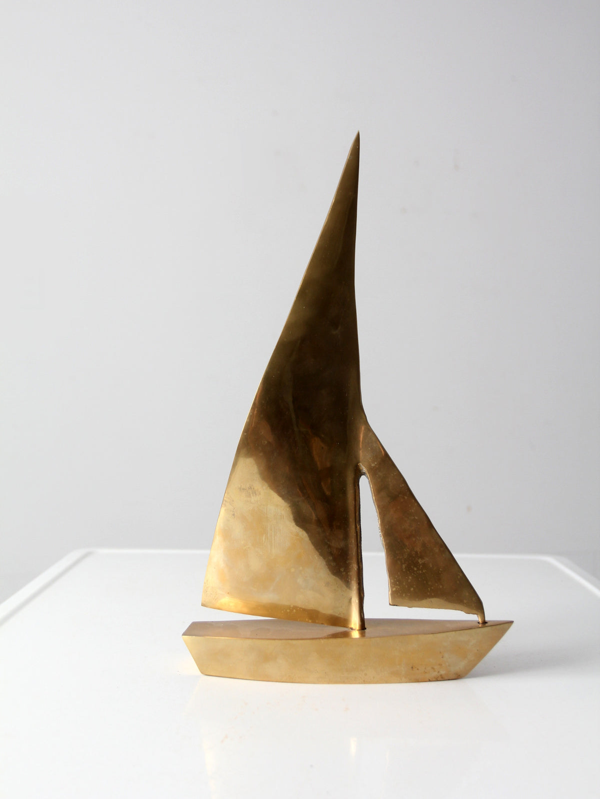 mid-century brass sailboat