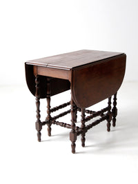 antique Jacobean draw leaf gate leg table