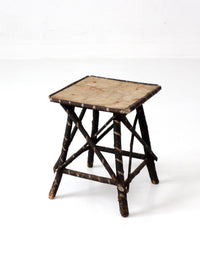 antique Adriondack twig table with floral top