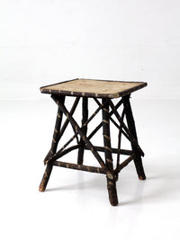 antique Adriondack twig table with floral top