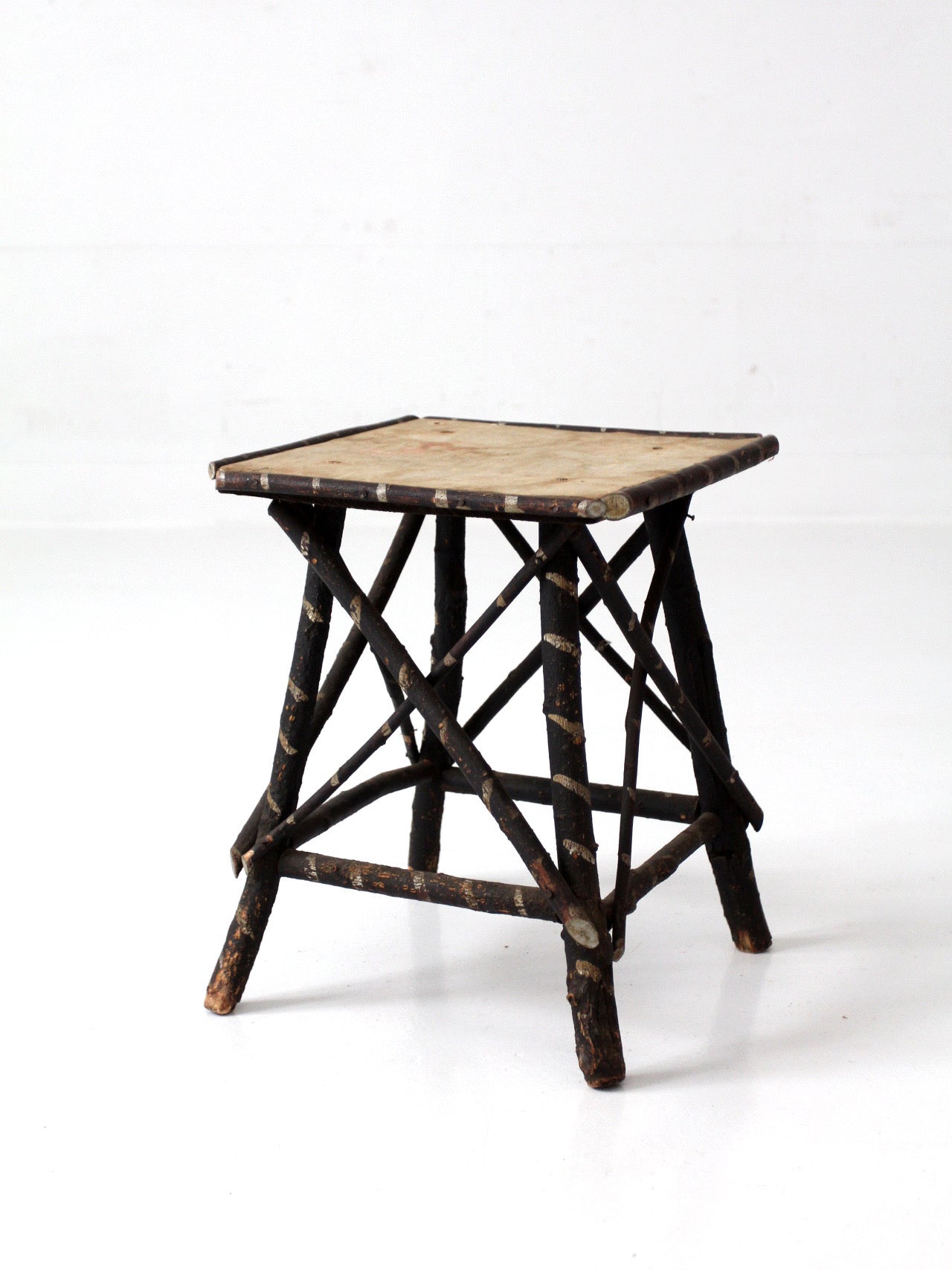 antique Adriondack twig table with floral top
