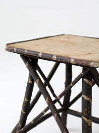 antique Adriondack twig table with floral top