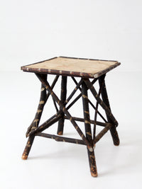 antique Adriondack twig table with floral top