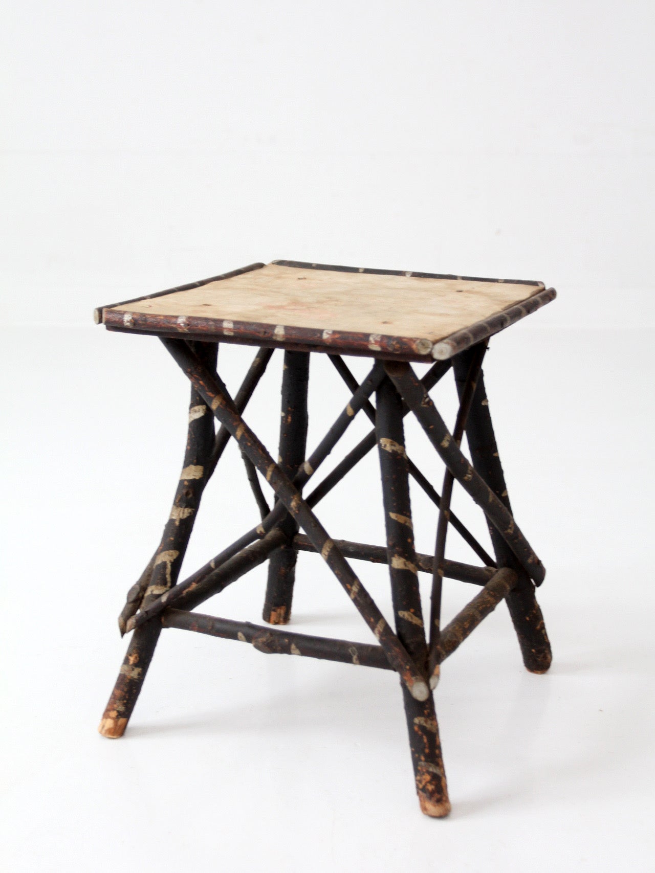 antique Adriondack twig table with floral top