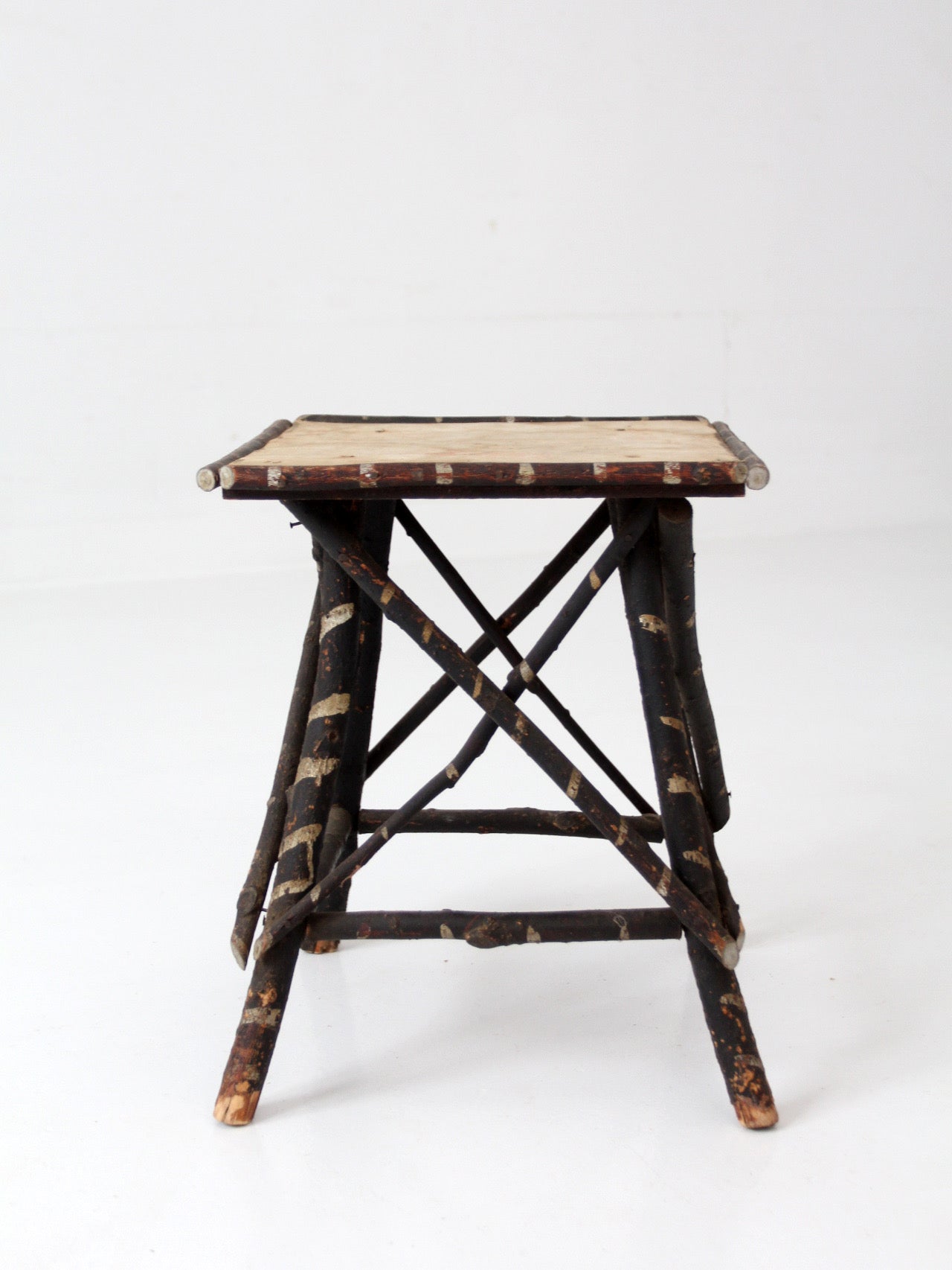 antique Adriondack twig table with floral top