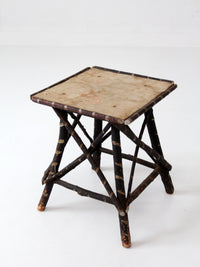 antique Adriondack twig table with floral top