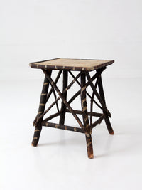 antique Adriondack twig table with floral top