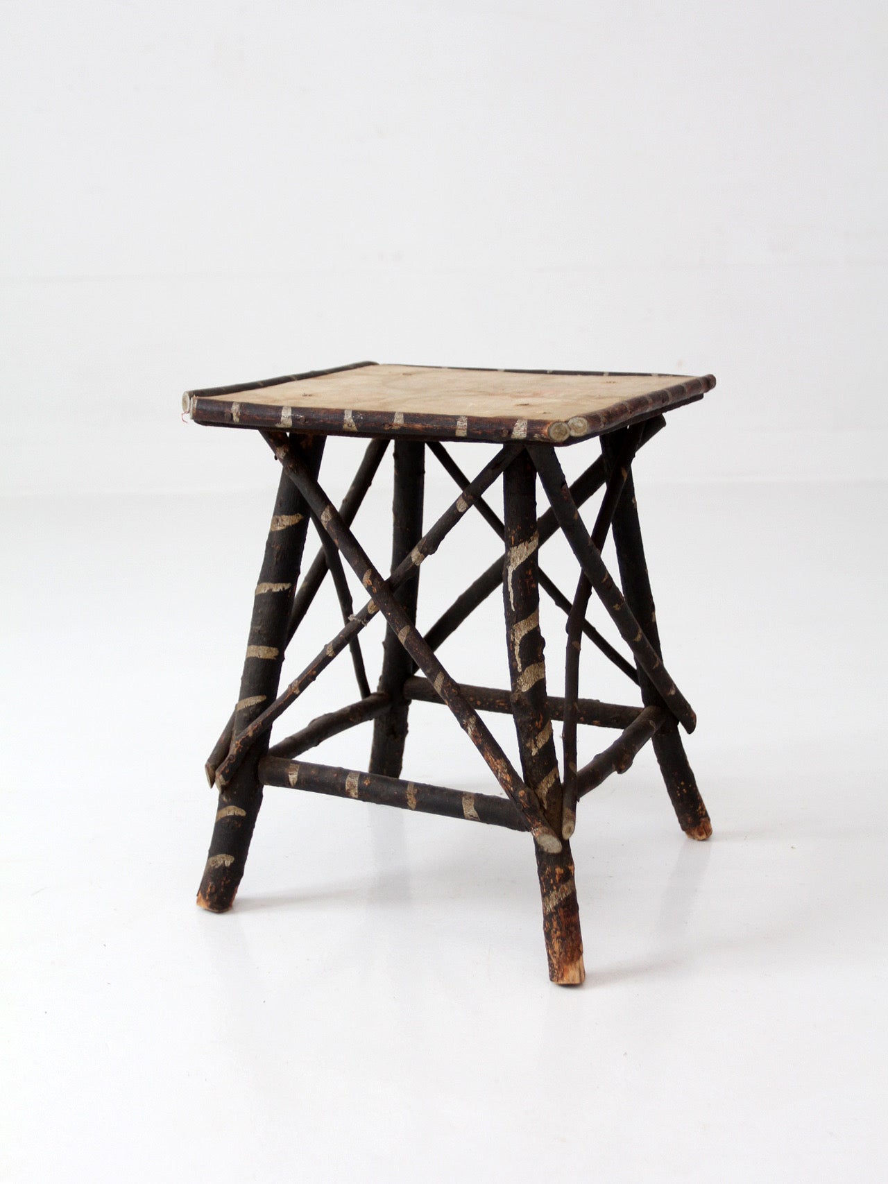 antique Adriondack twig table with floral top