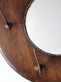 antique Victorian round wood hall mirror